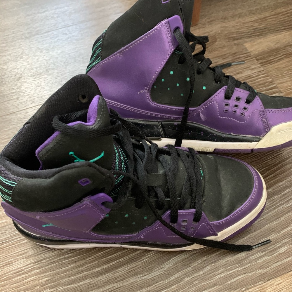 High top Jordan basketball shoes.